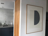  Serigraphy print 'Big Grey' crafted by Emma Lawrenson in oak wood frame in living room.